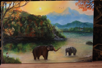 Elephants playing in forest sunrise